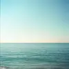 ocean, dreamy, invoking property, indescribable mystery, clear sky --no ugly, deformed, noisy, blurry, distorted, out of focus, extra fingers, bad anatomy, extra limbs, poorly drawn face, poorly drawn