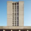 一张粗糙的混凝土建筑的照片，就像一座功能失调的高大建筑，简约的设计没有地方，柔和的光线下柔和的色彩，广角前视图--ar 2：1 --没有树木、植物、动物、人、车辆--风格原始--v5.2