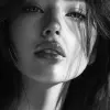 hyper-realistic photograph, woman, stunning, black and white, shot on a Sony A7III --ar 1:2 --stylize 250