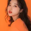photography, orange hue, korean woman model, solid orange backdrop, using a camera setup that mimics a large aperture, f/1.4 --ar 9:16 --style raw