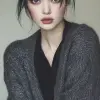 时尚杂志摄影，黑发模特女模特坐在镜头前，穿着轻薄优雅的秋冬系列，敞开毛衣搭配连衣裙衬衫，Canon EOS-1D，f/5.6，扎实轻盈的背景，衬托工作室灯光--ar 9：16