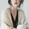 时尚杂志摄影，黑发模特女模特坐在镜头前，穿着轻薄优雅的秋冬系列，敞开毛衣搭配连衣裙衬衫，Canon EOS-1D，f/5.6，扎实轻盈的背景，衬托工作室灯光--ar 9：16
