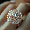 detail shot of an exquisite, minimalist ring, showcasing a perfect union of gold and diamond, ring adorns the finger of a professional jewelry model, its intricate design gracefully wrapping around, e