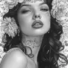 female, fantasy, beauty, in the style of noir comic art, realistic hyper-detailed portraits, tattoo, black and white grayscale, chicano art, realistic yet romantic, flowing lines --ar 23:36 --stylize 