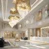 精品酒店大堂，豪华吊灯与大理石地面，金色与米白色调，奢华现代风格，迎宾前台和沙发区细致，暖色灯光渲染空间，环境高贵，建筑设计效果图     --ar 4:3