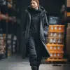 冬季仓库搬运，女士加厚工装外套与防滑靴，深灰与黑色调，耐用工装风格，外套拉链与靴子细节，仓库灯光与衣物形成冷暖对比，服饰设计效果图     --ar 3:4