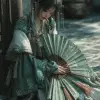 动漫古风庭院中的美少年，手执折扇与流苏，墨绿与米白色调，国风唯美风格，发饰点缀玉珠，月光洒在青石地面，氛围静谧高雅     --ar 3:4