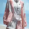 夏季沙滩徒步，女士防晒外套与速干短裤，浅粉与白色调，休闲户外风格，外套透气网眼与拉链细节，阳光下衣物轻盈，服饰设计效果图     --ar 3:4