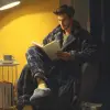 秋季夜晚阅读，男士法兰绒睡袍与厚棉拖鞋，深灰与藏蓝色，温暖家居风格，睡袍腰带与袖口设计突出，暖黄台灯光下衣物层次分明，服饰设计效果图     --ar 3:4